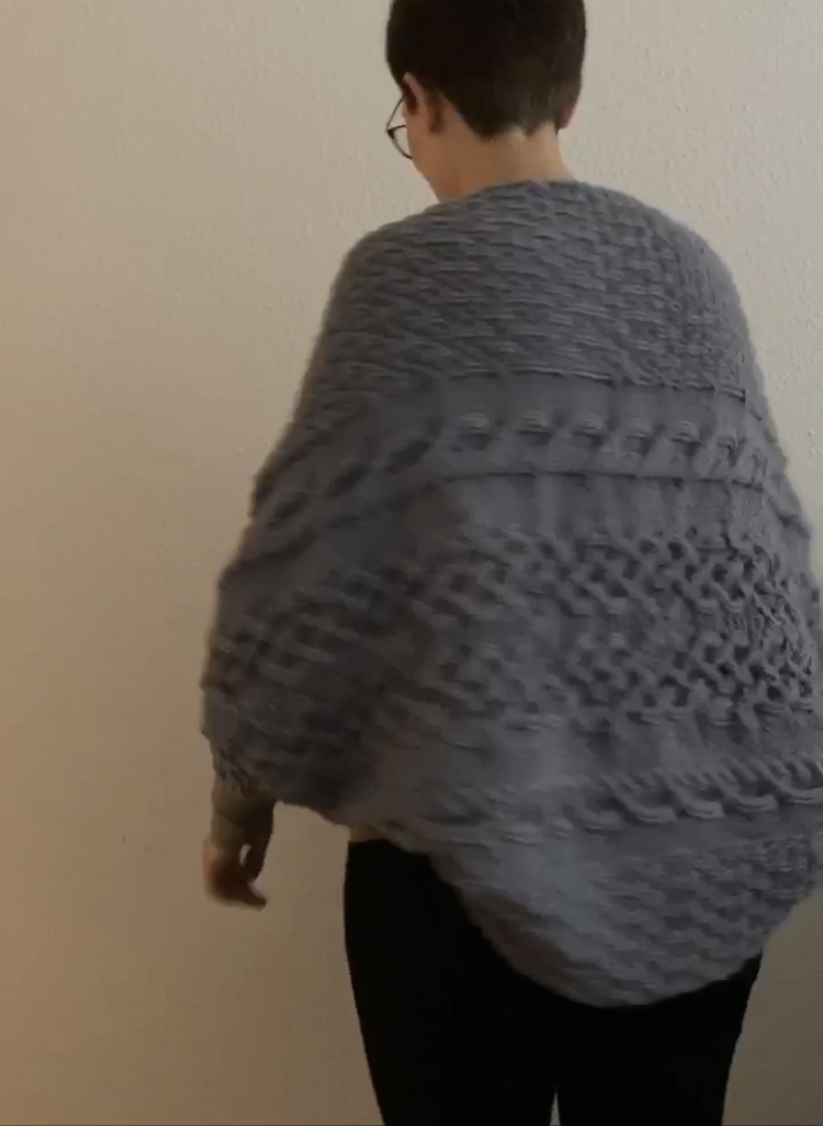 Completed woman's cardigan, technique: knitting